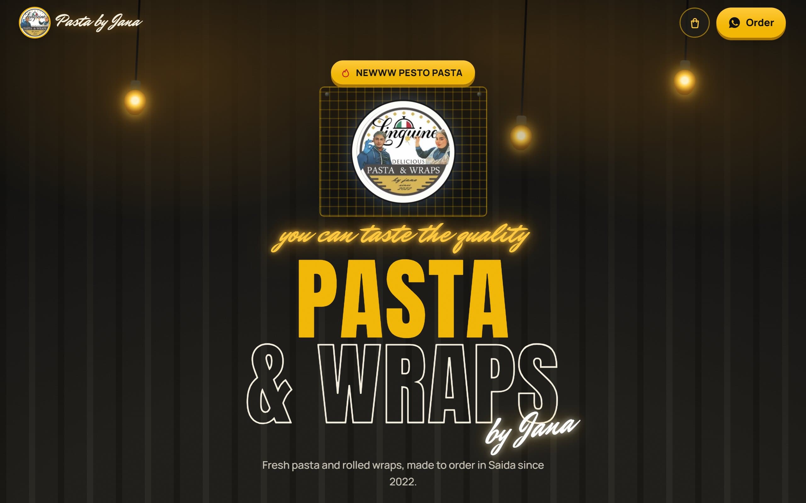 Pasta by Jana storefront: the restaurant's logo under hanging lights, with the Pasta & Wraps wordmark and an order button